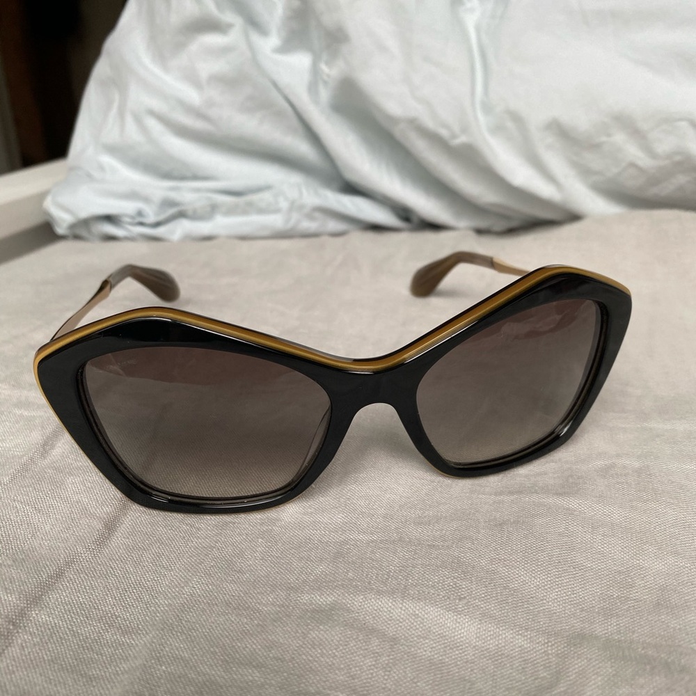 Miu Miu cat eye sunglasses with gold strip